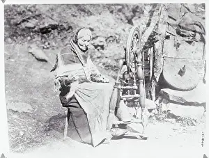 Woman Spinning Thread