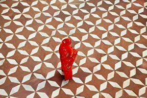 Images Dated 16th April 2016: Woman standing on designed flooring