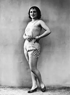 Woman Standing In Lingerie