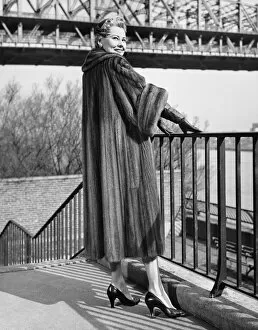 Railing Collection: Woman standing at riverside, (B&W)