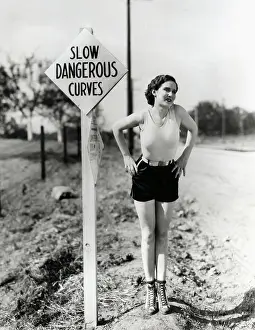 Caution Prints: Woman Standing Along Road