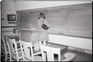 Berkeley Prints: Woman Stands in Empty Classroom with Note