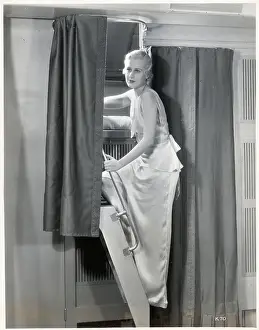 Nightgown Prints: Woman on Step to Sleeping Berth on Train