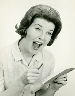 Raised Eyebrow Prints: Woman in striped blouse with surprised facial expression