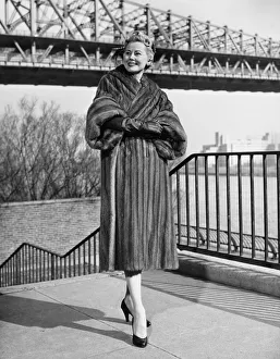 Railing Collection: Woman strolling at riverside, (B&W)