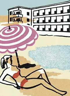 Woman Sun Bathing on the Beach