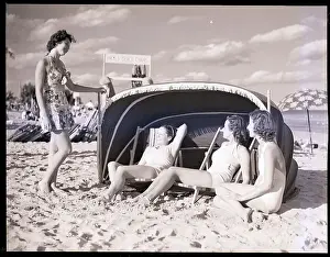 Woman Under Sun Shelter