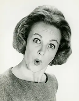 Wavy Hair Prints: Woman with surprised expression, posing in studio, (B&W), (Portrait)