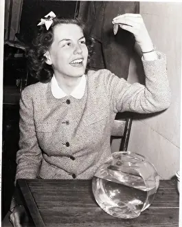 Swallowing Prints: Woman About to Swallow Live Goldfish