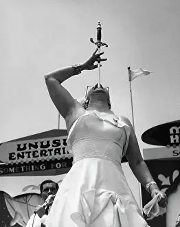 Daredevil Prints: Woman Swallowing Sword at Sideshow