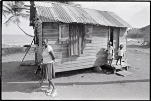Broom Prints: Woman Sweeping in Front of House