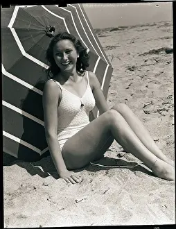 Woman in Swimsuit Seated