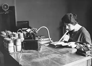 Woman Talking into Early Dictaphone