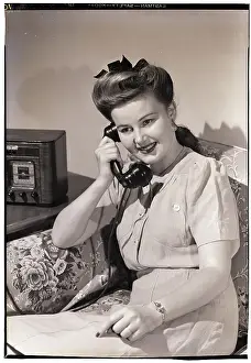 Woman Talking on Telephone