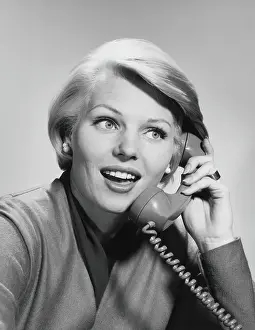One Mature Woman Only Prints: Woman on telephone, smiling