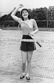 Images Dated 27th September 2014: Woman at tennis court
