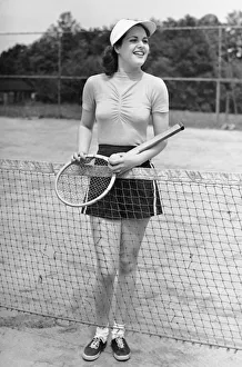 Images Dated 27th September 2014: Woman at tennis court
