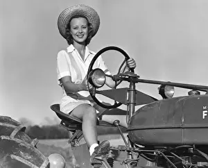 Woman on tractor