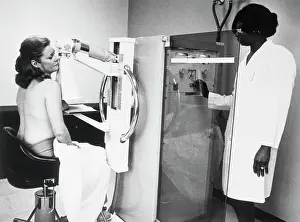 Woman Undergoing Mammogram