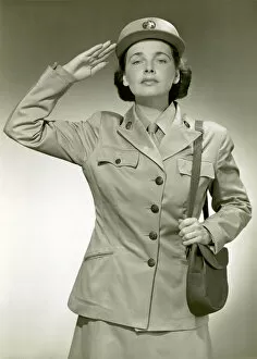 Images Dated 10th September 2005: Woman in uniform saluting