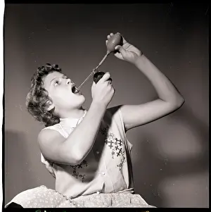 Spraying Prints: Woman Using an Atomizer