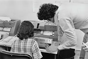 Huty37738 Prints: Woman Using Card Punch