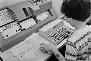 Huty37738 Prints: Woman Using Card Punch