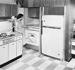 Convenience Prints: A Woman Using A Combination Washer Dryer