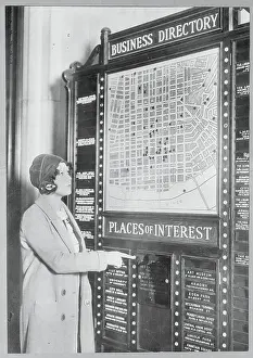 Cincinnati Prints: Woman Using an Electronic Business Directory