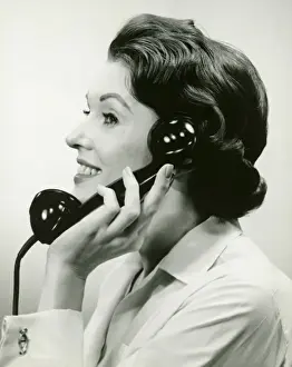 On The Phone Prints: Woman using phone, posing in studio, (B&W), (Close-up)