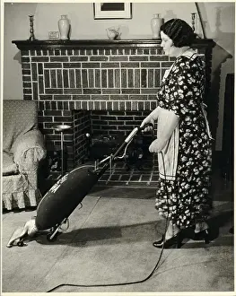 Cleaning Prints: Woman Vacuuming