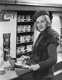 Woman w / coffee on tray