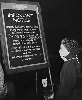 Gas Mask Prints: Woman W/Gas Mask Reads Sign; Rr Delays
