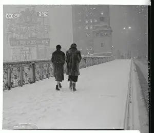 Woman Walking Across Bridge