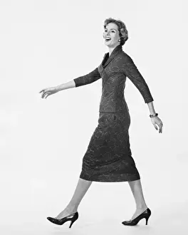 Grainy Prints: Woman walking and smiling