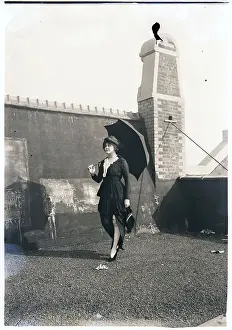 1910s Style Prints: Woman Walking W/Parasol/Leg Exposed