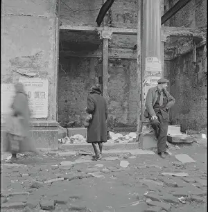 Warsaw Prints: Woman Walking Through Wreckage
