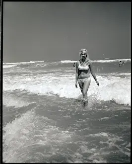 Bikini Prints: Woman Walks Out Of Ocean Surf