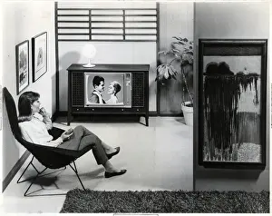 Remote Control Prints: Woman Watching TV in Living Room