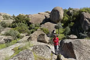 Woman wearing a backpack while hiking in the Latmos Mountains, Lake Bafa, Besparmak Mountains, Mugla Province, Aegean region, Turkey