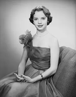 Off Shoulder Prints: Woman wearing dress sitting in chair, portrait