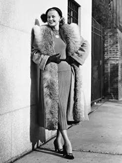 1950s Style Prints: Woman wearing fur coat posing outdoors, (B&W), (Portrait)