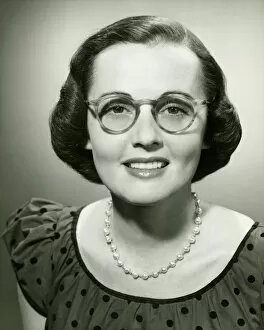 Pearl Collection: Woman wearing glasses posing in studio, (B&W), (Close-up), (Portrait)