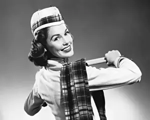 Plaid Prints: Woman wearing glengarry cap and tartan