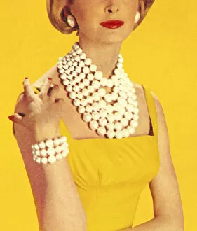 Pearl Collection: Woman Wearing Jewelry and a Yellow Dress