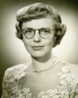 1950s Style Prints: Woman wearing lace dress posing in studio, (B&W), (Close-up), (Portrait)