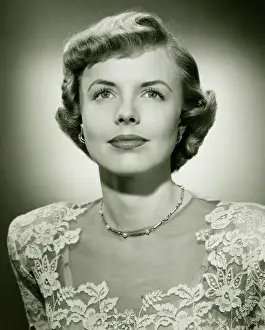 1950s Style Prints: Woman wearing lace dress posing in studio, (B&W), (Close-up), (Portrait)