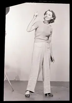 Beckoning Prints: Woman Wearing Long Trousers
