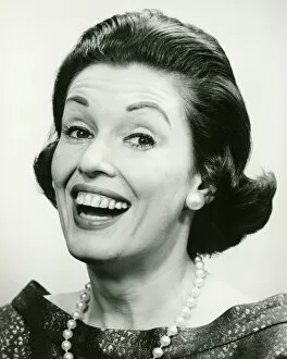 Pearl Collection: Woman wearing pearls smiling (B&W), (Portrait)