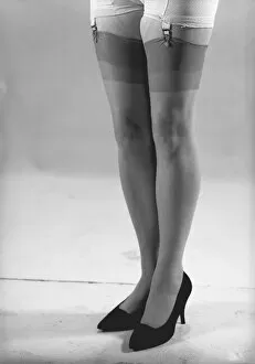 Woman wearing stockings, (B&W), (low section)